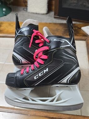 CCM Black Ice Hockey Skates with Pink Laces